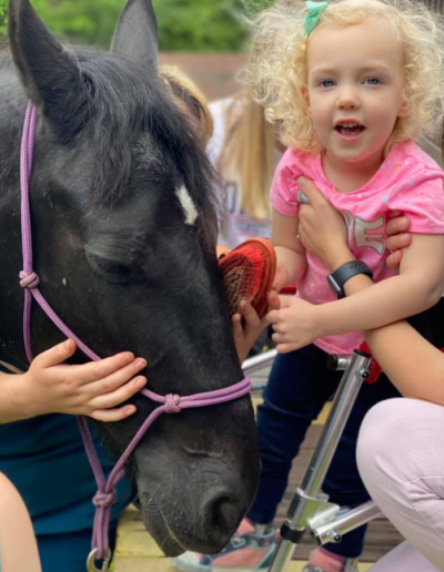 Pediatric Physical Therapy with horses at Sumlar Therapy Services, Inc