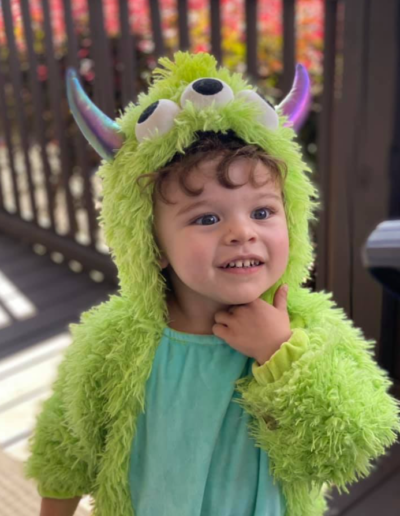 Girl in a monster costume at Sumlar Therapy Services, Inc