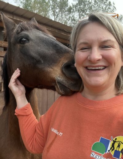 Occupational therapist with horse at Sumlar Therapy Services